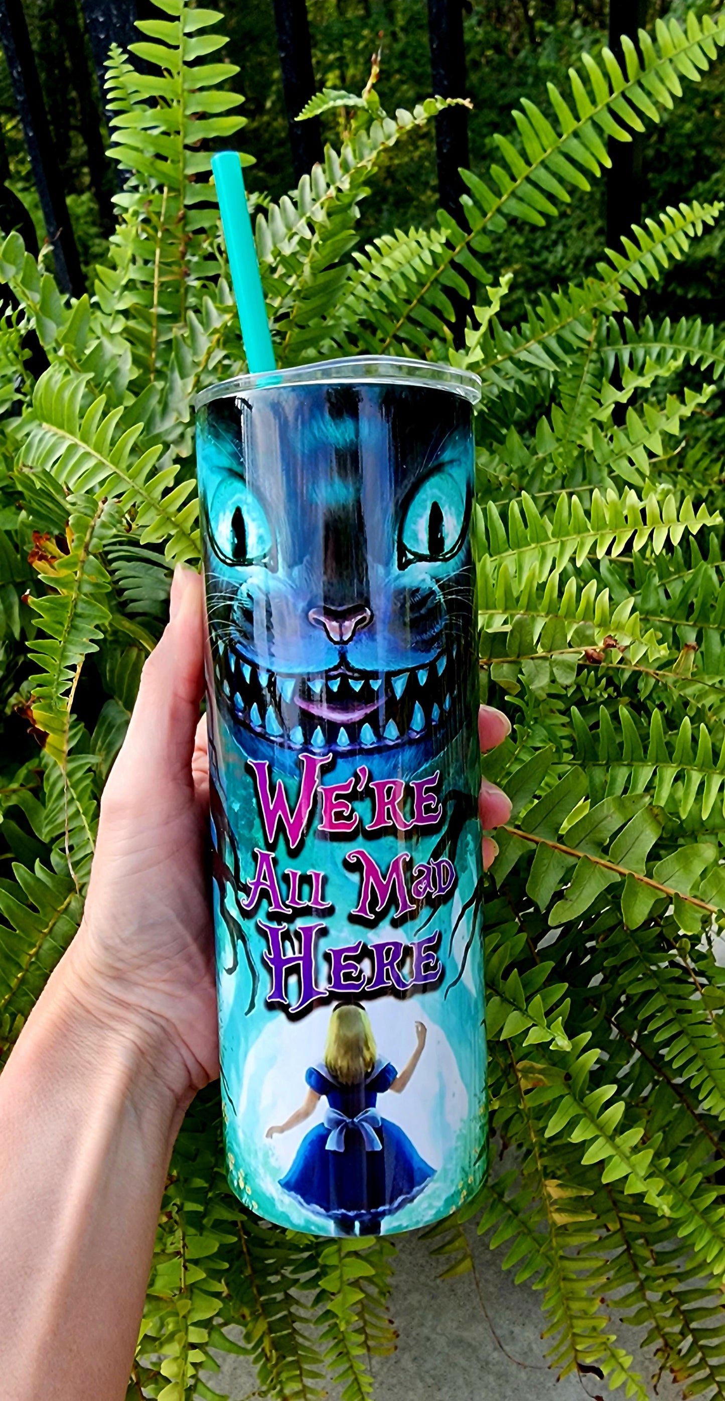 20oz We're All Mad Here Stainless-Steel Double Walled Tumbler with teal straw.
